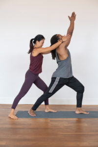 Mana assisting student
